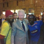 Former US president Bill Clinton with some illegal vendors in Florence