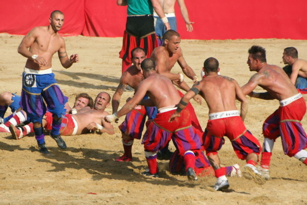 Calcio fiorentino (also known as calcio storico "historic football") is an early form of football that originated in 16th century Italy.Calcio fiorentino (also known as calcio storico "historic football") is an early form of football that originated in 16th century Italy.