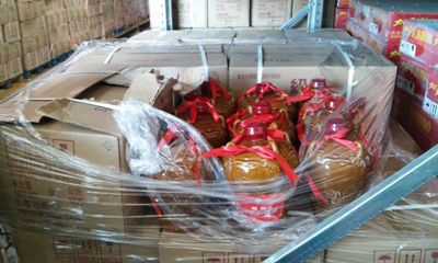 Italy's state forestry corps and the customs agency seized 20,000 bottles of fake wine and grappa