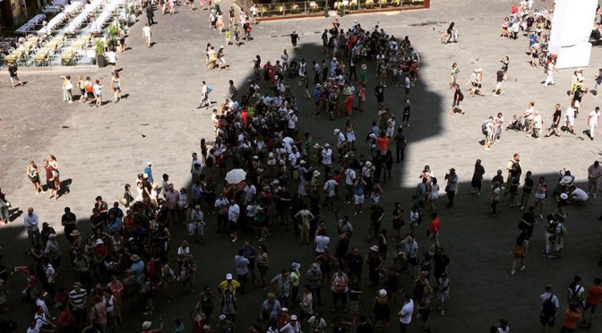 Looking for the shade in piazza Signoria, Florence
