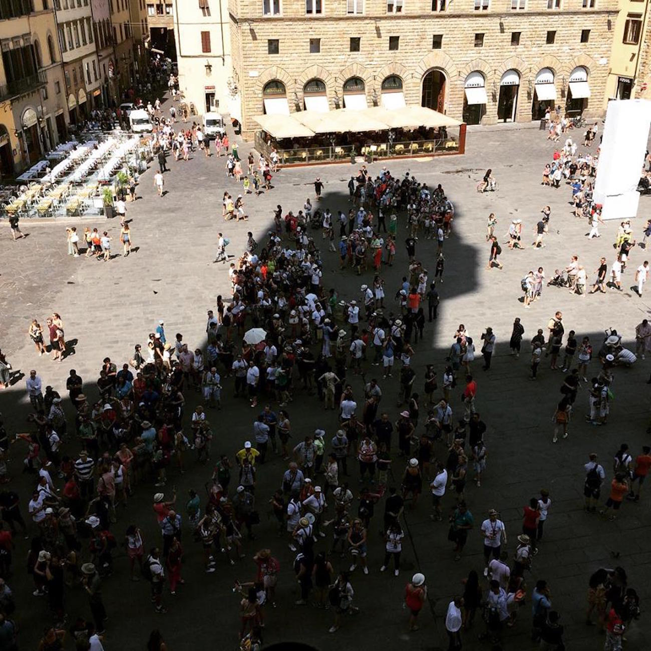 Looking for the shade in piazza Signoria, Florence