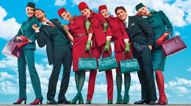 Alitalia flight attendants start wearing new uniforms