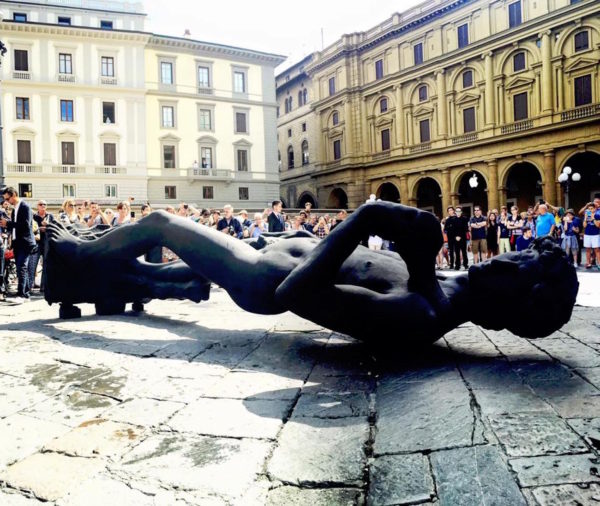 The Black David statue is flying in piazza della Repubblica, Florence, Italy
