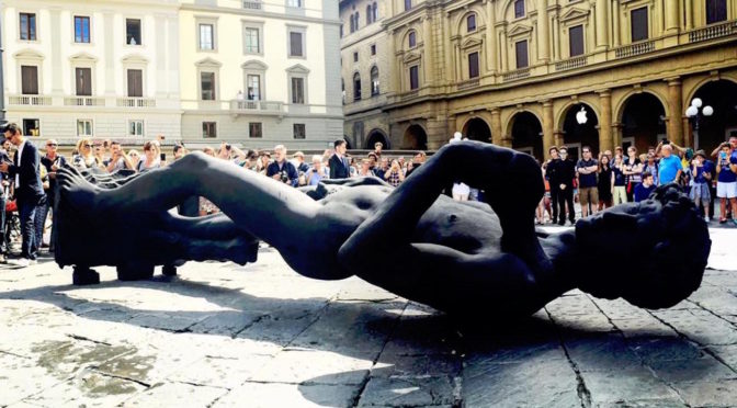 The Black David statue is flying in piazza della Repubblica, Florence, Italy