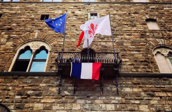 The flag of France on Palazzo Vecchio after the terrorist attack in Nice