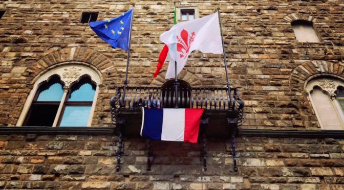 The flag of France on Palazzo Vecchio after the terrorist attack in Nice