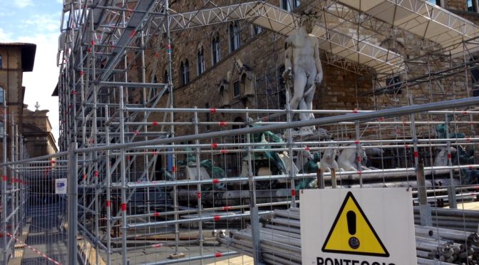 The fountain of Neptune under restoration in Florence, Italy