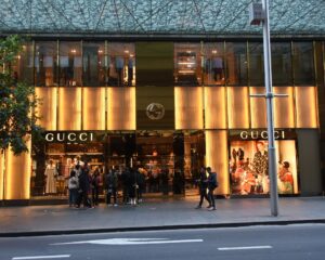 Over the past century, Gucci has grown from a small Florentine workshop into an international powerhouse, now part of Kering.