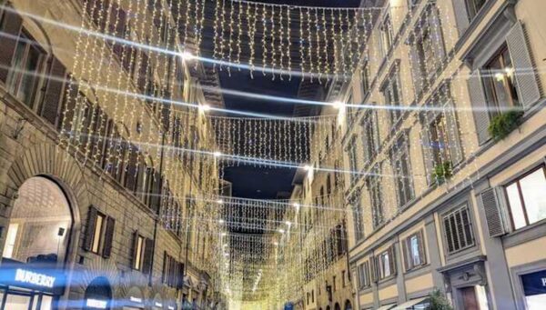 Christmas lights switched on in Via Tornabuoni, extending across Florence’s luxury fashion district